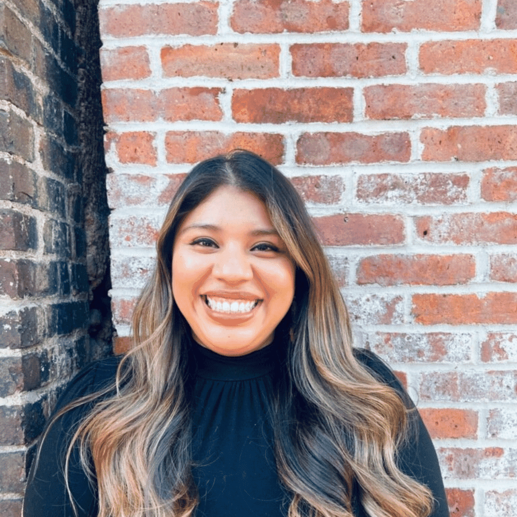 Portrait of Leslie Chavez, a professional stylist at Soho Salon, showcasing their expertise and style.