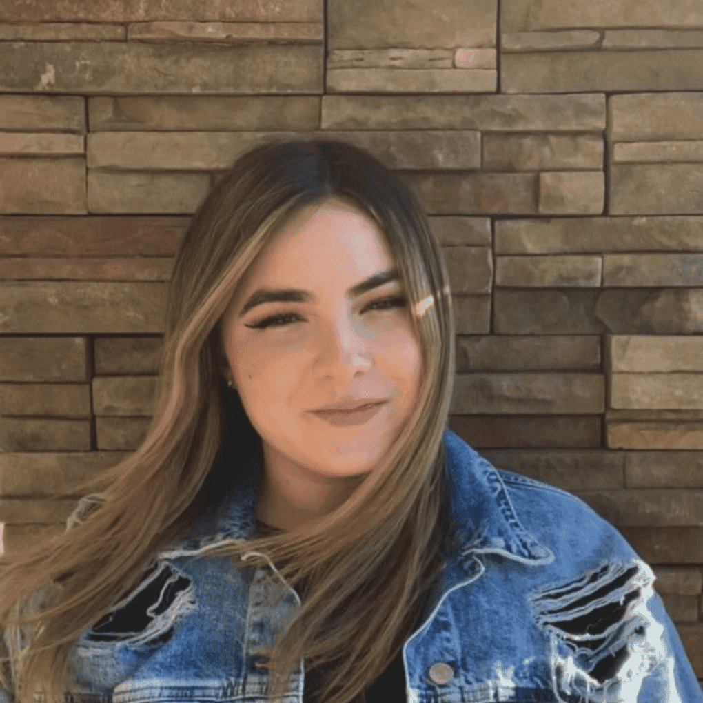 Portrait of Lily Lopez-Evans, a professional stylist at Soho Salon, showcasing their expertise and style.