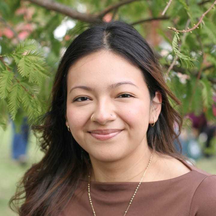 Portrait of Sarai Chavez Flores, a professional stylist at Soho Salon, showcasing their expertise and style.