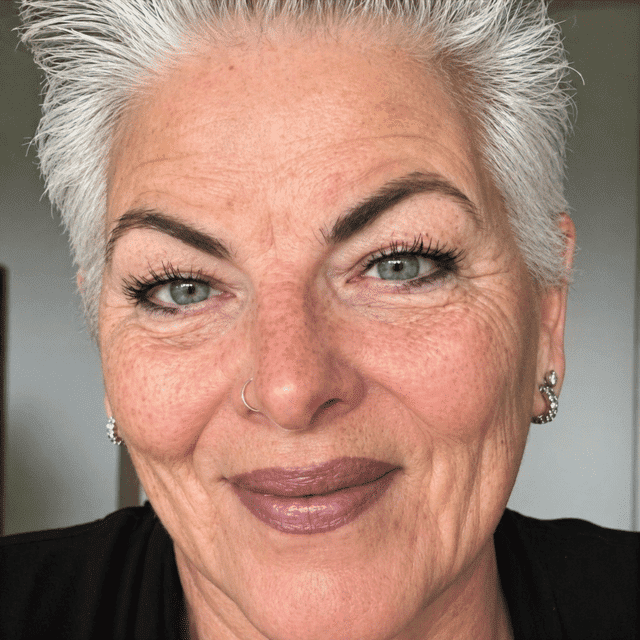 Portrait of Karen Foulds, a professional stylist at Soho Salon, showcasing their expertise and style.