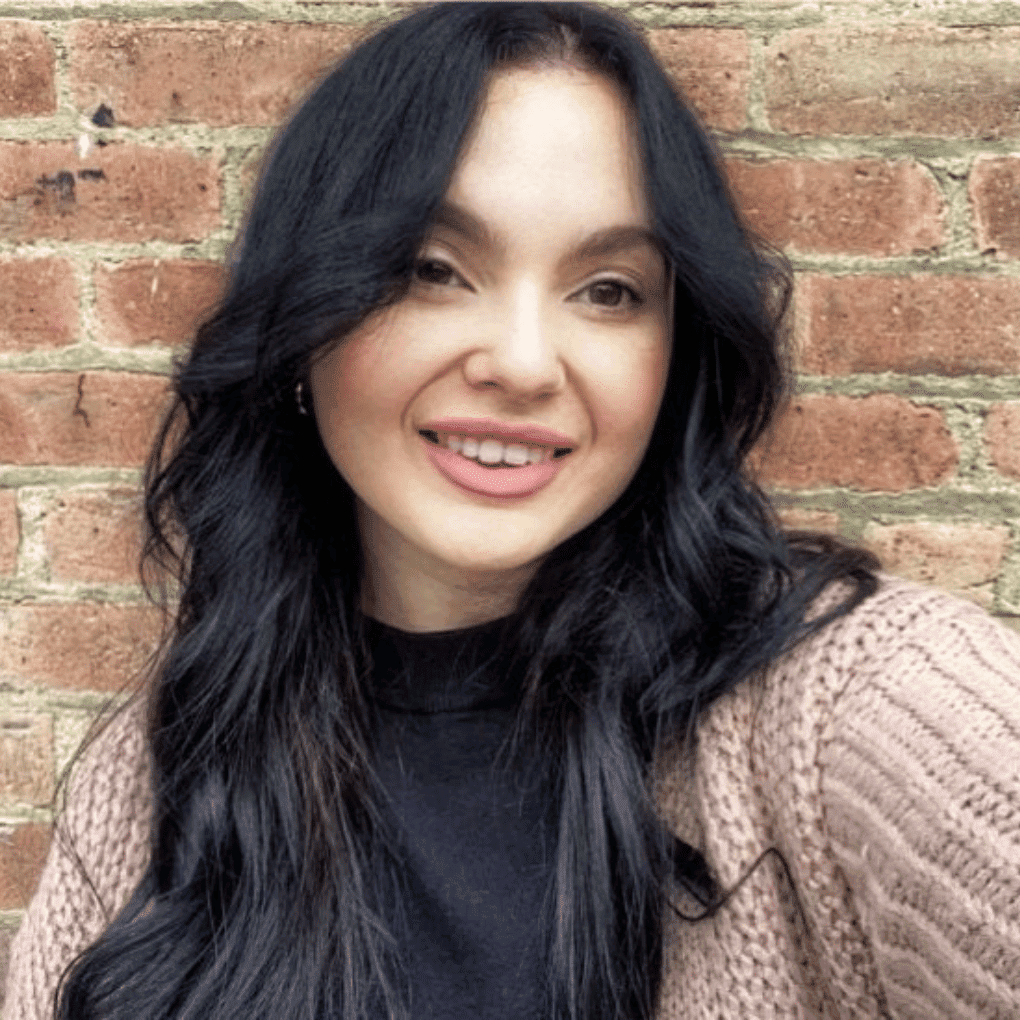 Portrait of Adrianna Cannella, a professional stylist at Soho Salon, showcasing their expertise and style.