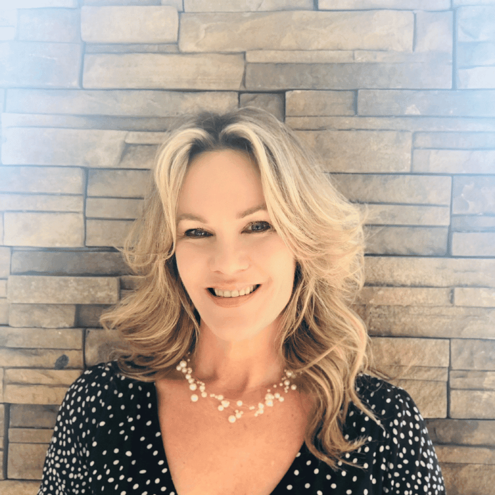 Portrait of Susan Stokdal-Hock, a professional stylist at Soho Salon, showcasing their expertise and style.