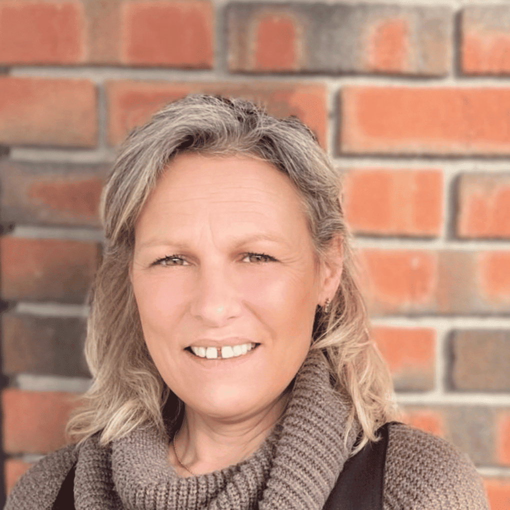 Portrait of Wendy Dugain, a professional stylist at Soho Salon, showcasing their expertise and style.