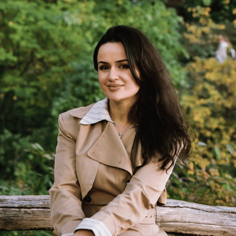 Portrait of Dorina Lisi, a professional stylist at Soho Salon, showcasing their expertise and style.