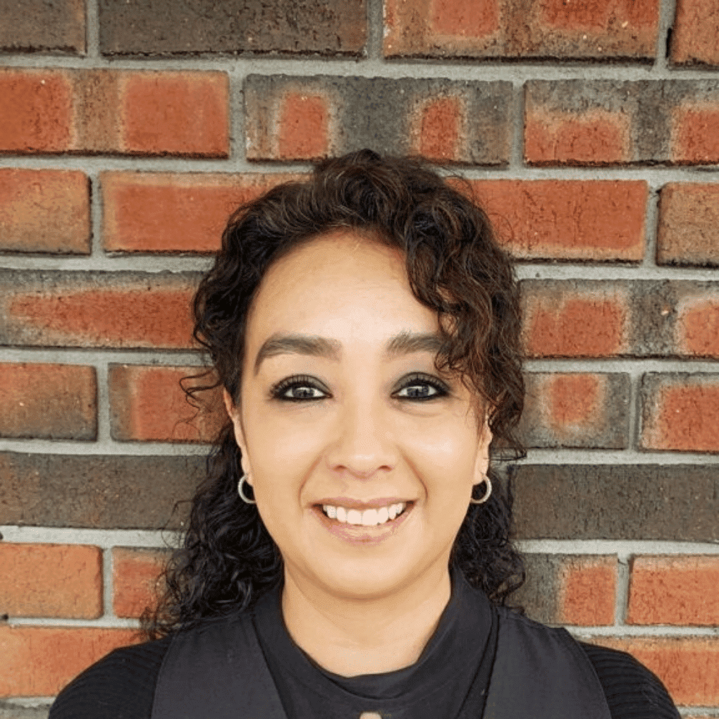 Portrait of Natalia Abril, a professional stylist at Soho Salon, showcasing their expertise and style.