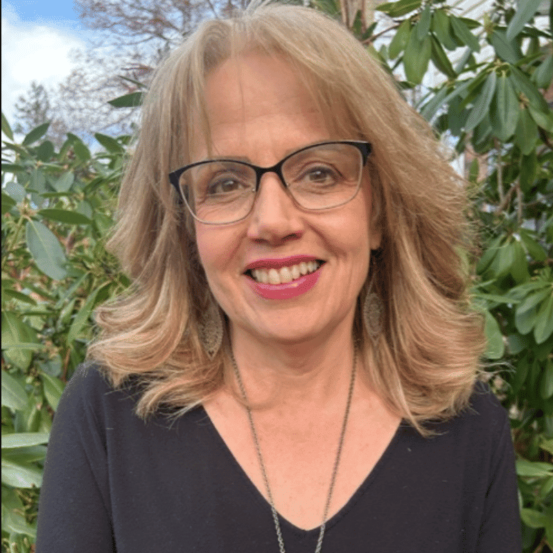 Portrait of Mary White, a professional stylist at Soho Salon, showcasing their expertise and style.